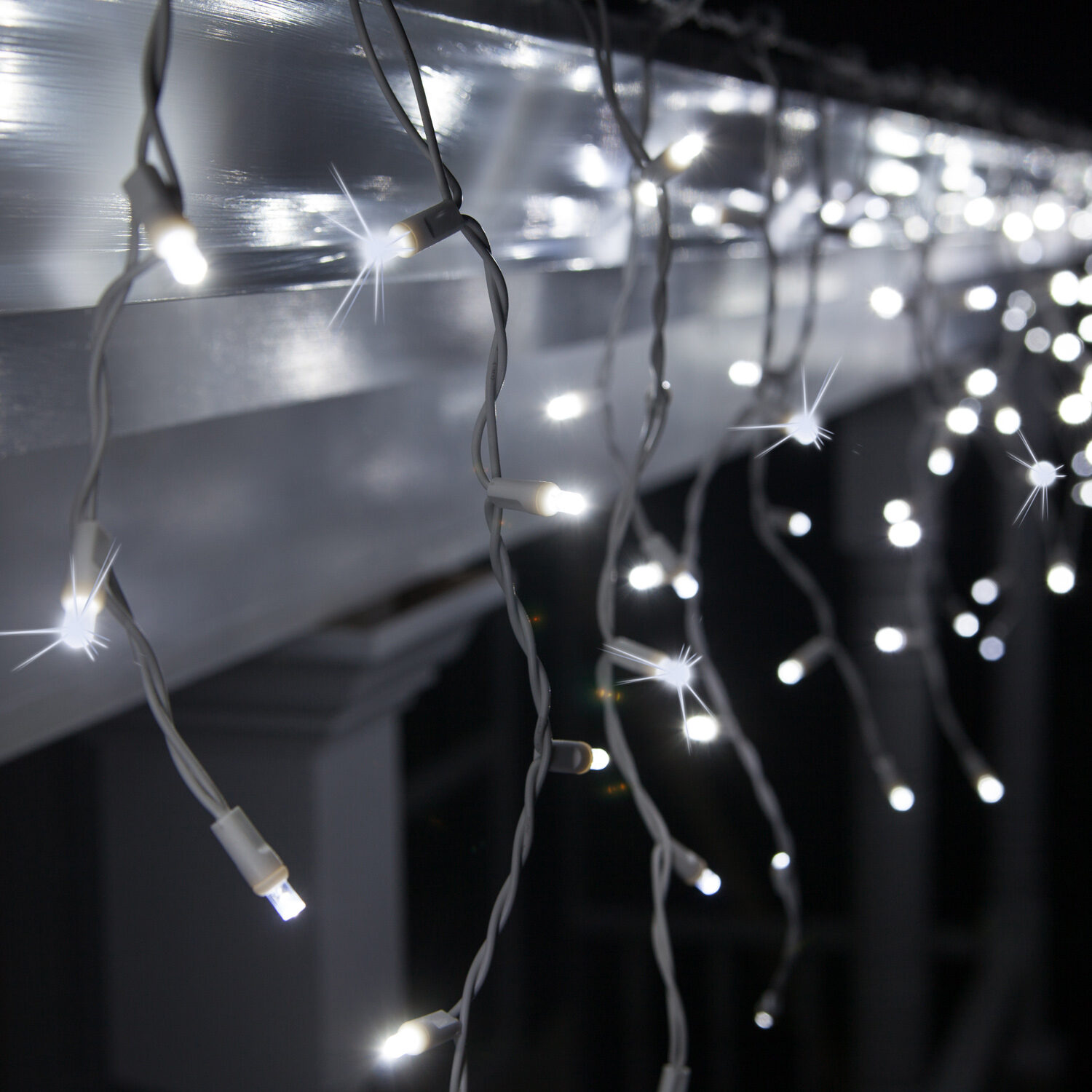 70 5mm LED Icicle Lights, Blue/Green, White Wire - Yard Envy