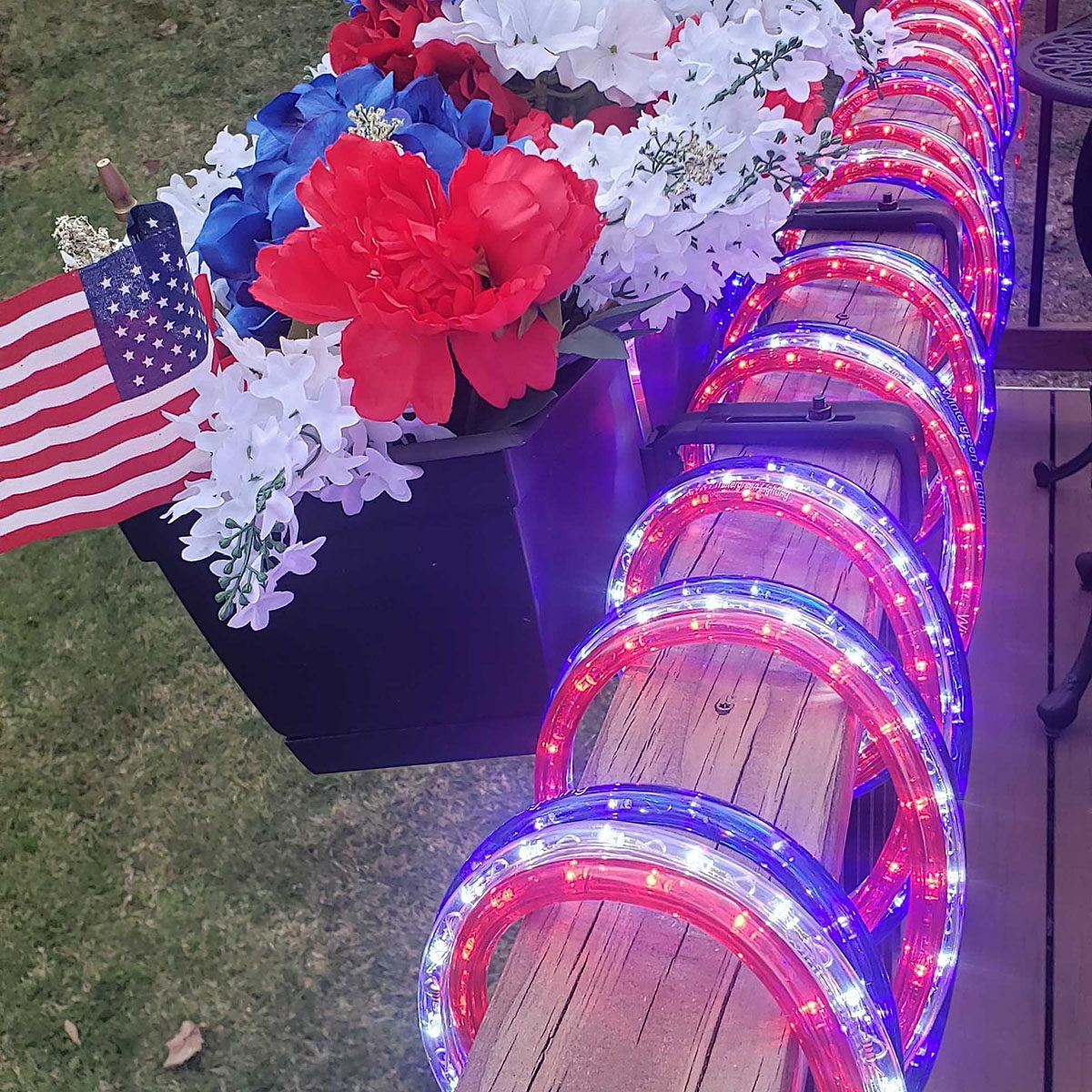 Red, White & Blue Rope Lights Wrapped Around Deck Railings