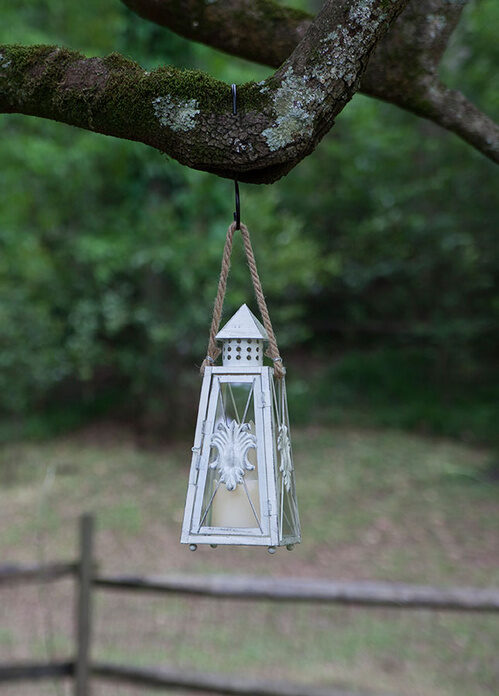 Hang Candle Lanterns during a backyard wedding or summer party for elegant lighting in no time!