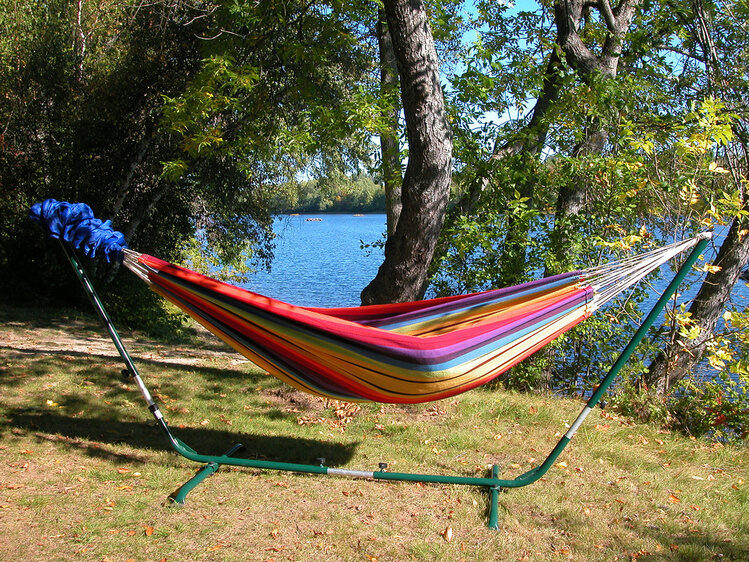 Hang a hammock in the backyard for you and your guests to enjoy the warm breeze!