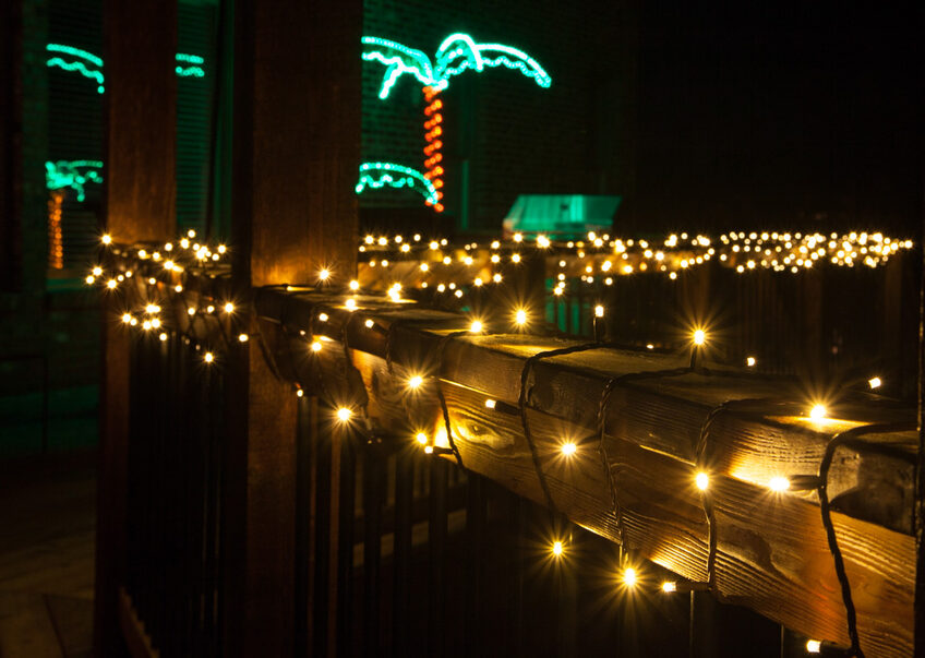 Wrap deck railings in mini lights to create an inviting evening glow during dinner parties or quiet nights!