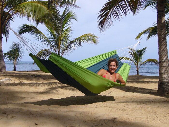 Hang a camping hammock at the beach! Advice for how to hang a hammock.